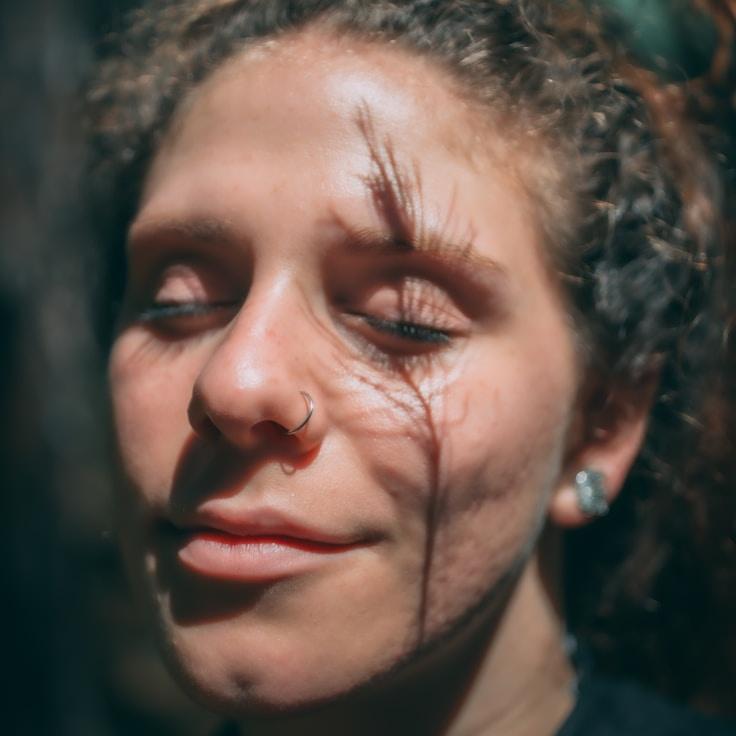 Ariya Kapoor, Lead Design Curator at SteadyTrailSignal, reviewing corporate floral arrangements